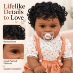 TOLIKE 20-Inch Reborn Baby Doll with Curly Hair & Peach Outfit